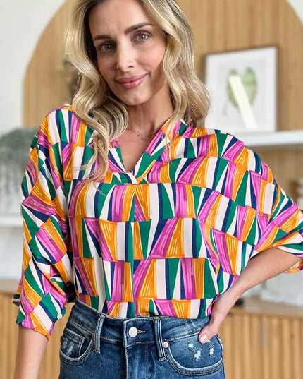 Double Take Full Size Geometric Notched Dolman Sleeve Top