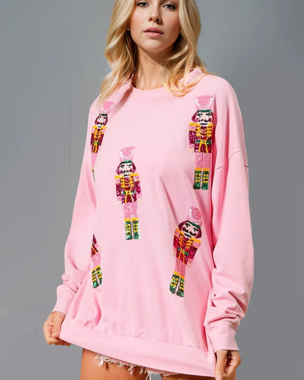 Double Take Sequin Nutcracker Round Neck Long Sleeve Sweatshirt Pink