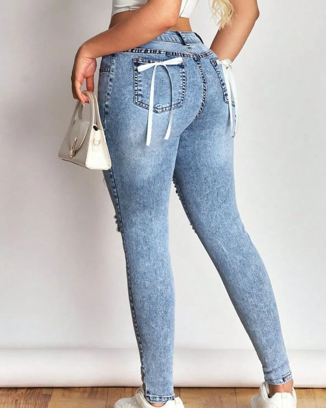 Distressed Skinny Jeans with Bow Back 