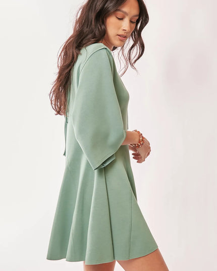 Davi & Dani Solid Draped Sleeve Ties Back Skort Romper