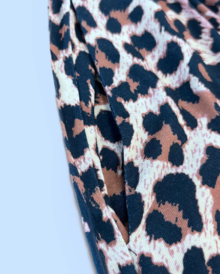 Double Take Printed Scoop Neck Sleeveless Buttoned Magic Dress with Pockets