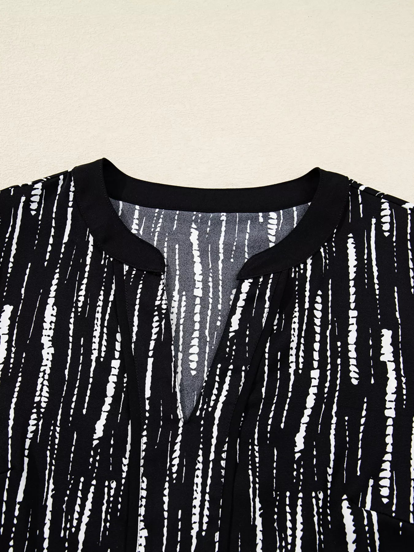 Abstract Printed Notched Long Sleeve Blouse