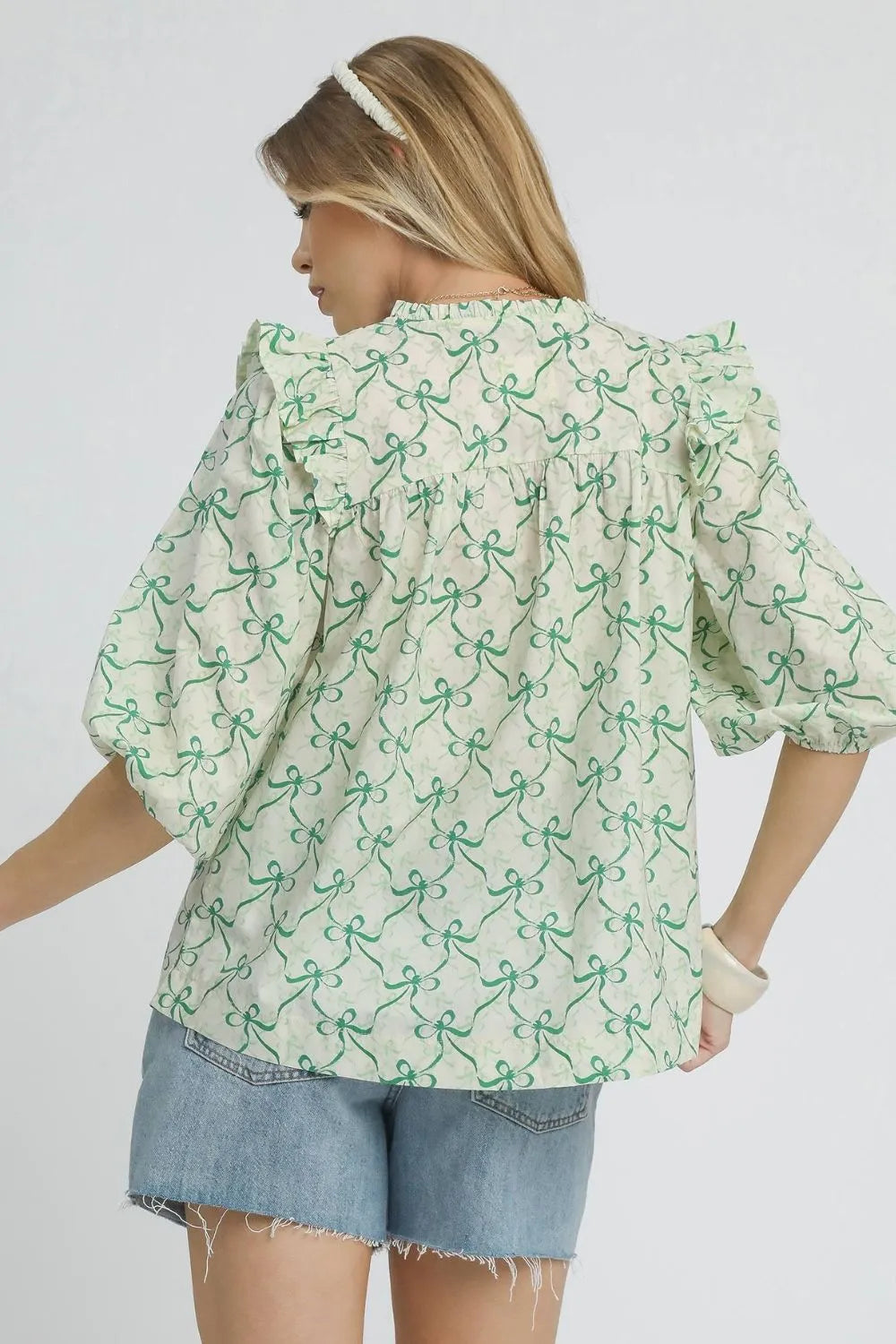 Umgee Ruffled Bow Print Notched Blouse