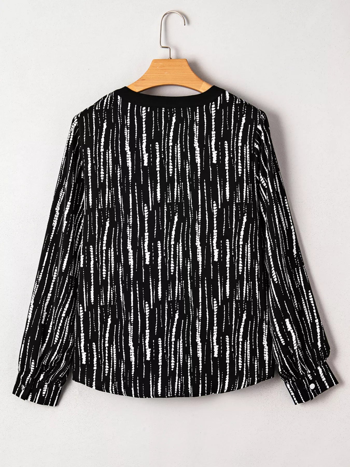 Abstract Printed Notched Long Sleeve Blouse