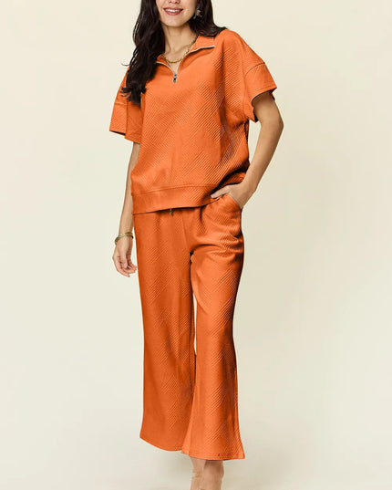 Double Take Full Size Texture Half Zip Short Sleeve Top and Pants Set Tangerine