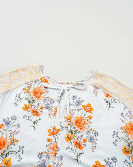 Plus Size Printed Tie Neck Long Sleeve Blouse