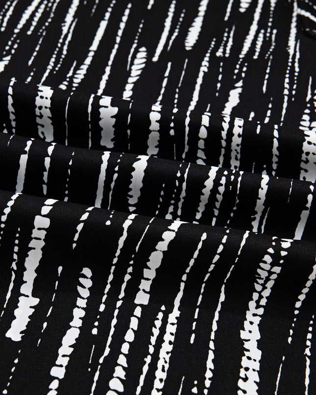 Abstract Printed Notched Long Sleeve Blouse