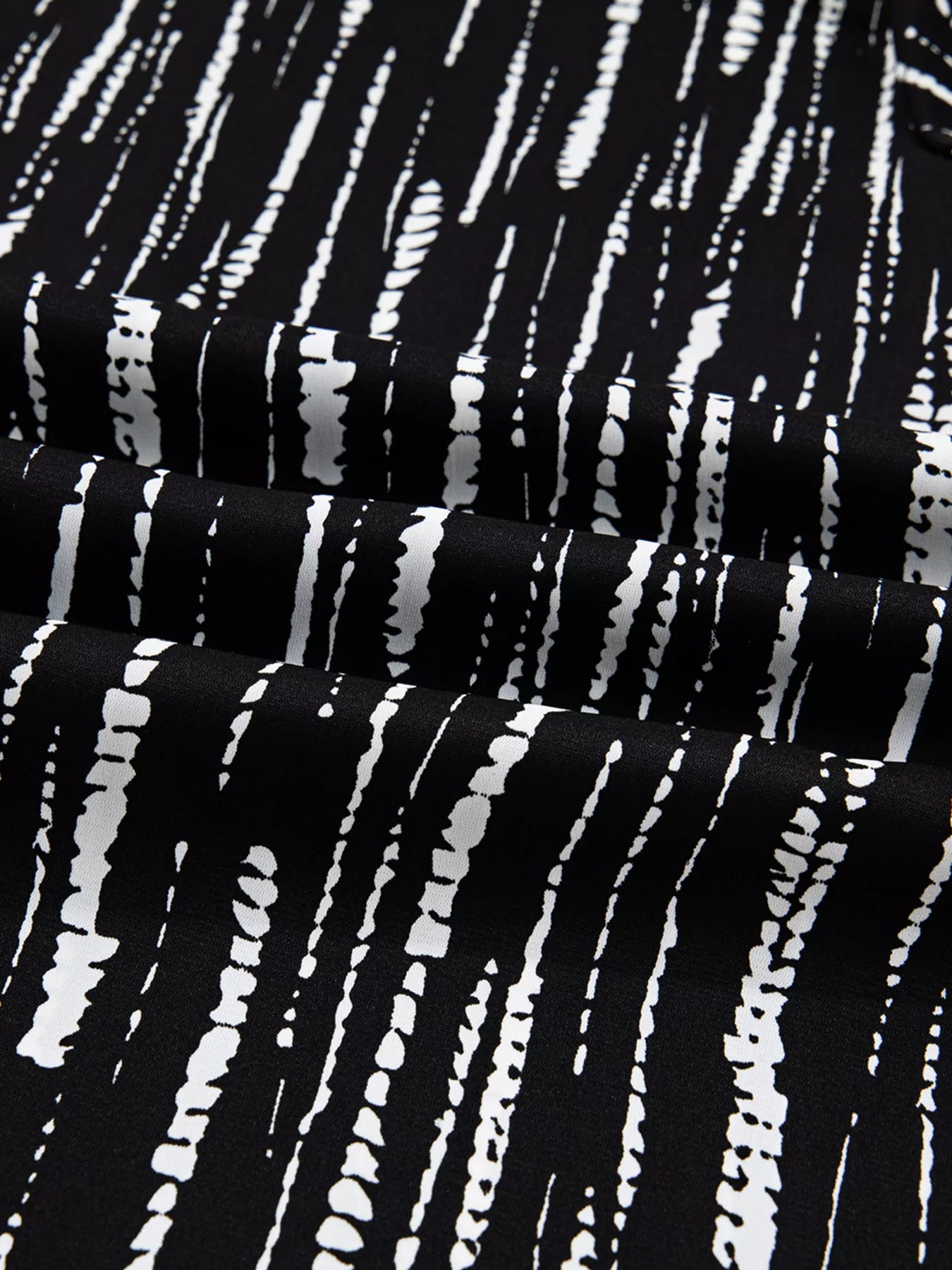 Abstract Printed Notched Long Sleeve Blouse