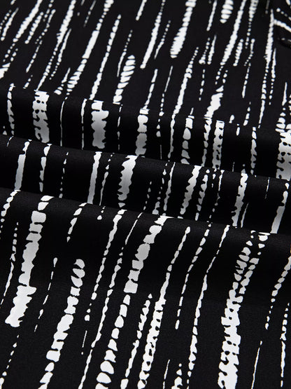 Abstract Printed Notched Long Sleeve Blouse