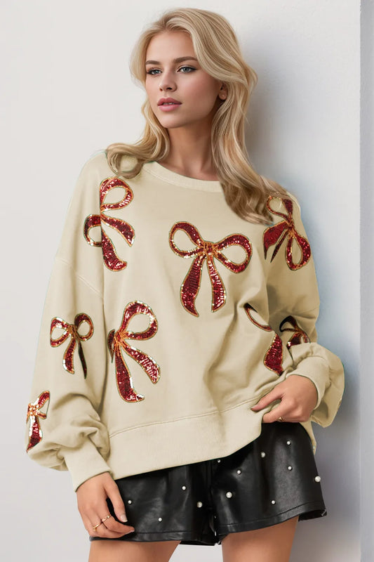 Double Take Christmas Bow Sequin Round Neck Dropped Shoulder Sweatshirt Cream