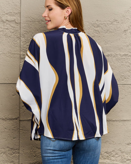 Perfee Tie Neck Printed Slit Sleeve Blouse