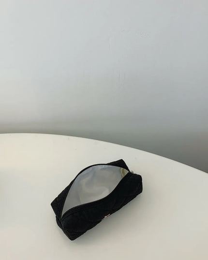 Bow Embroidered Quilted Storage Bag