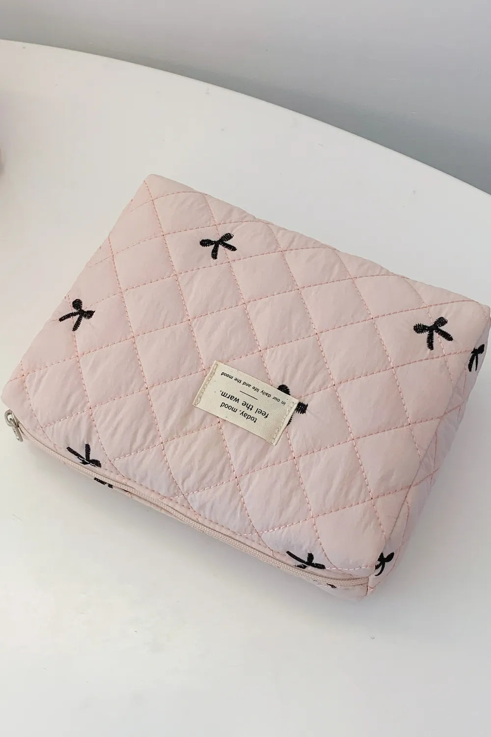 Bow Embroidered Quilted Storage Bag