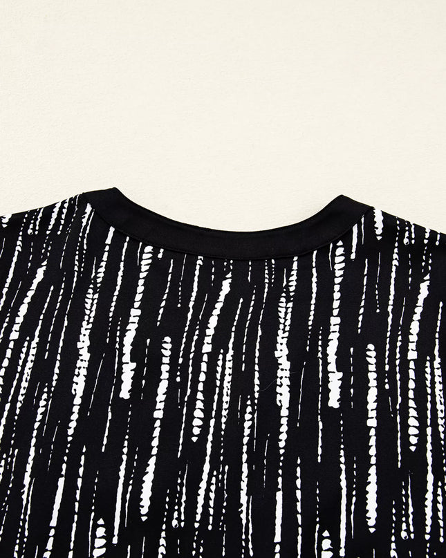 Abstract Printed Notched Long Sleeve Blouse