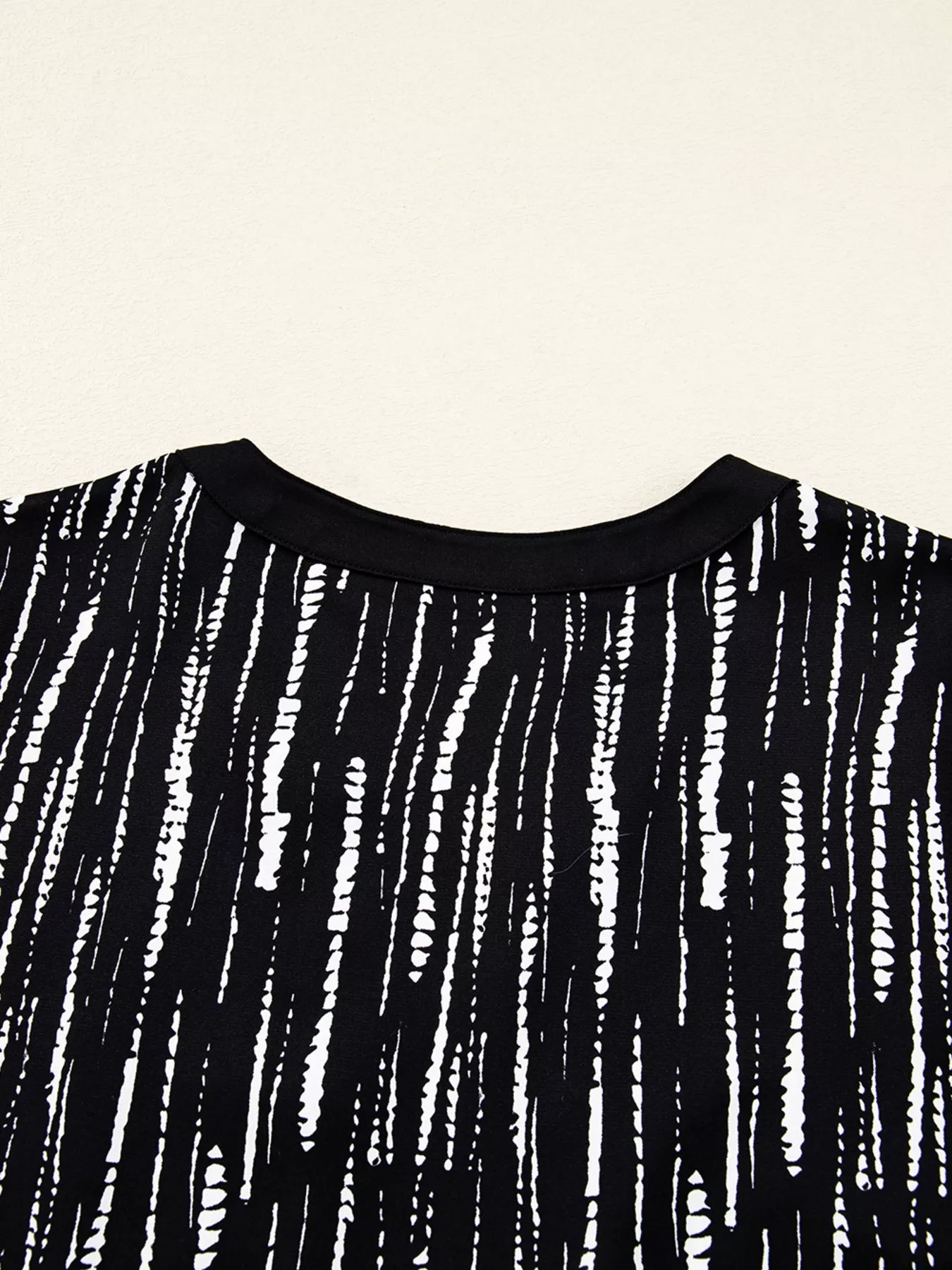 Abstract Printed Notched Long Sleeve Blouse