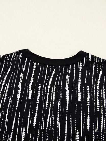 Abstract Printed Notched Long Sleeve Blouse