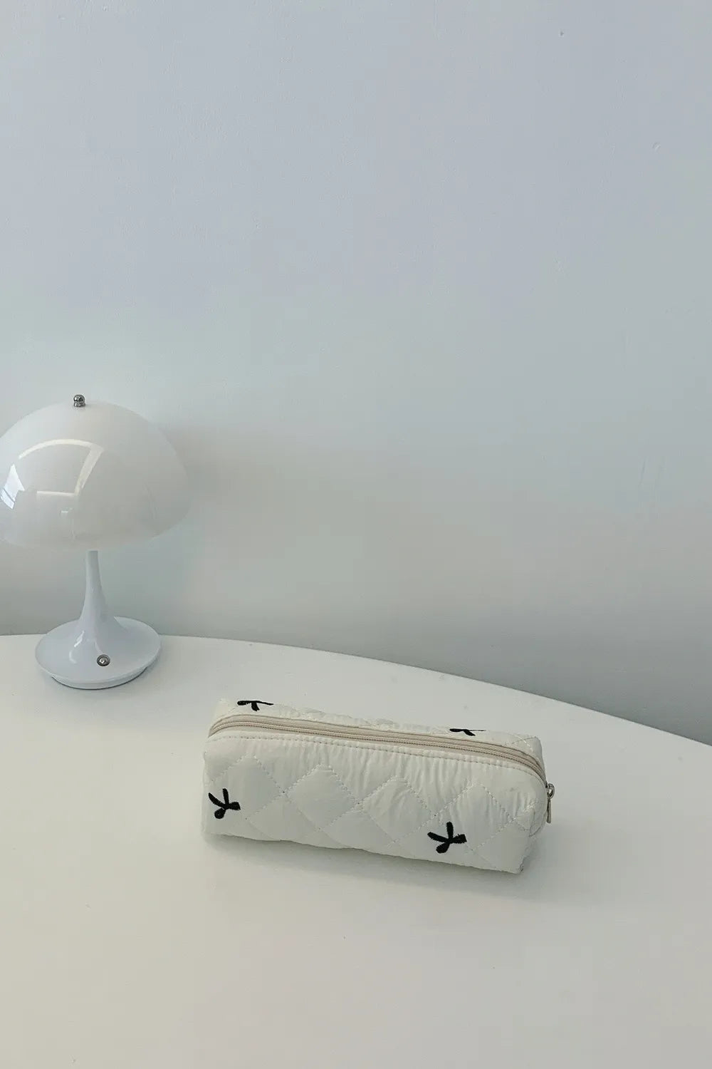 Bow Embroidered Quilted Storage Bag