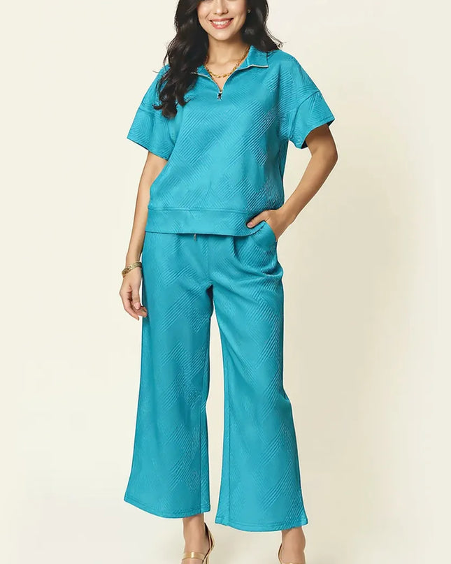 Double Take Full Size Texture Half Zip Short Sleeve Top and Pants Set Light Blue